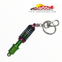 LLAVERO AMORTIGUADOR VERDE CON ROJO