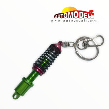 LLAVERO AMORTIGUADOR VERDE CON ROJO
